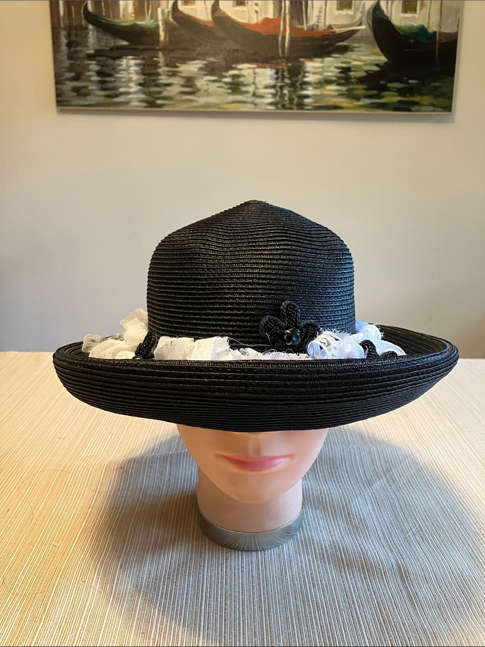 Elegant Black Hat with White Lace Trim and Black Beaded Floral Accents